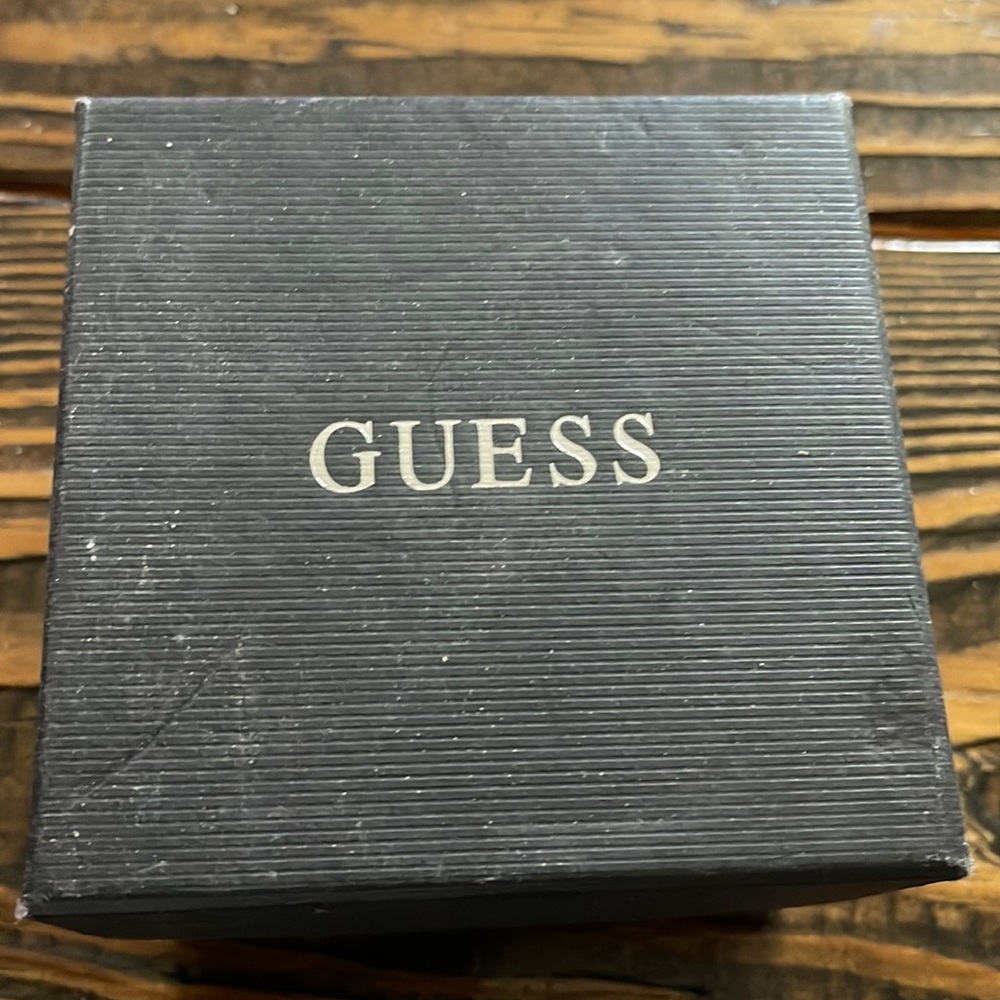 Guess Women`s Feminine Classic Hi-energy Bronze 38mm Watch. Model: U13631L1